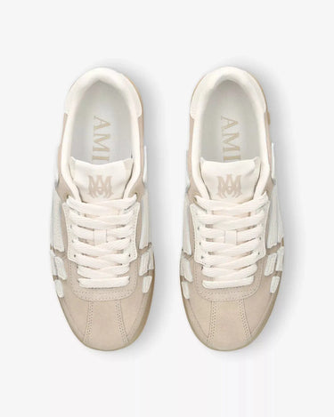 AMIRI Pacific Bones logo-embossed suede low-top trainers Amiri